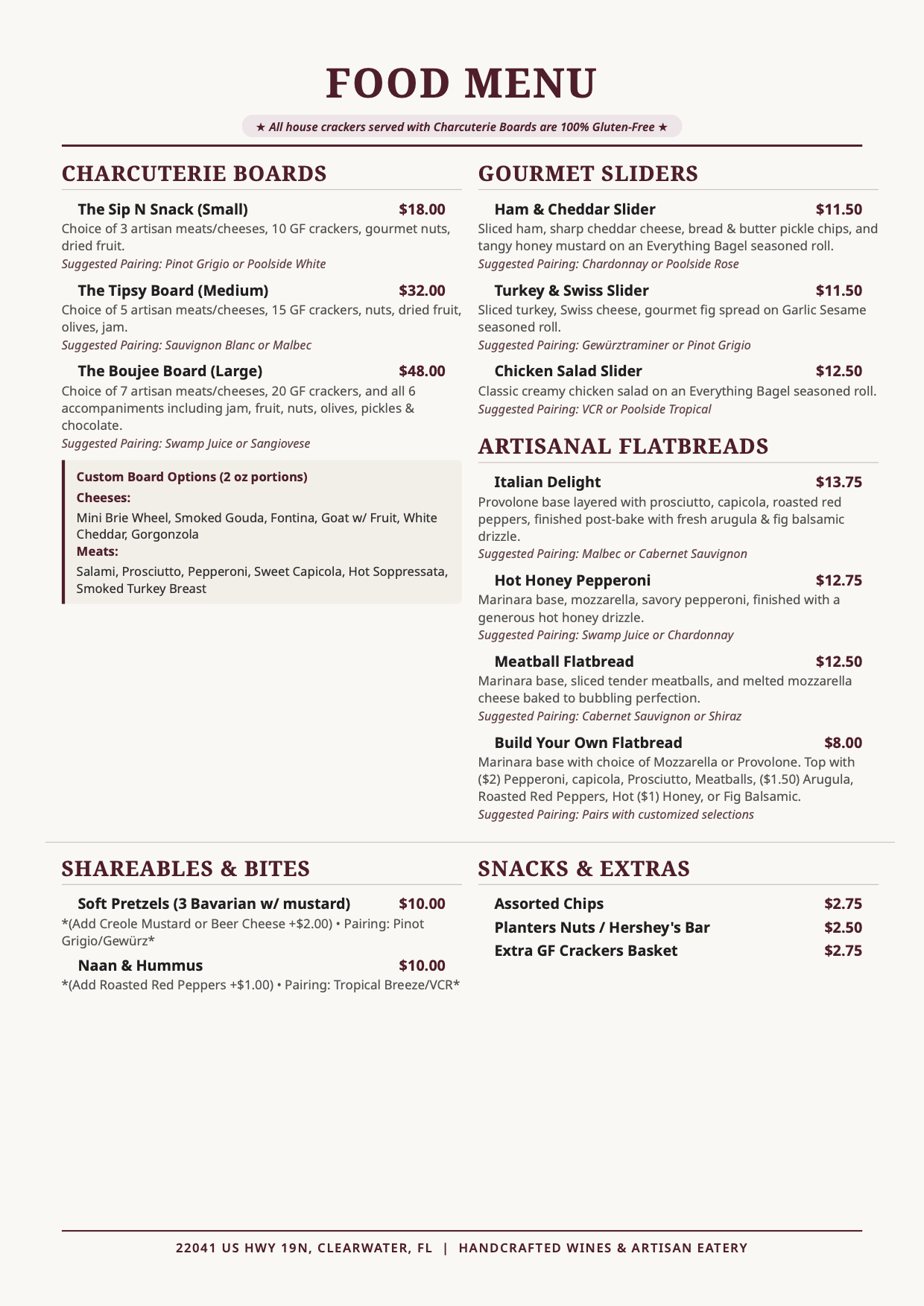 Aspirations Winery food menu in Clearwater FL featuring artisanal charcuterie boards (The Sip N Snack, The Tipsy Board, The Boujee Board), gourmet flatbreads, savory dips, and sweet bites paired with low-sulfite wines, sangrias, craft beer, and cocktails.